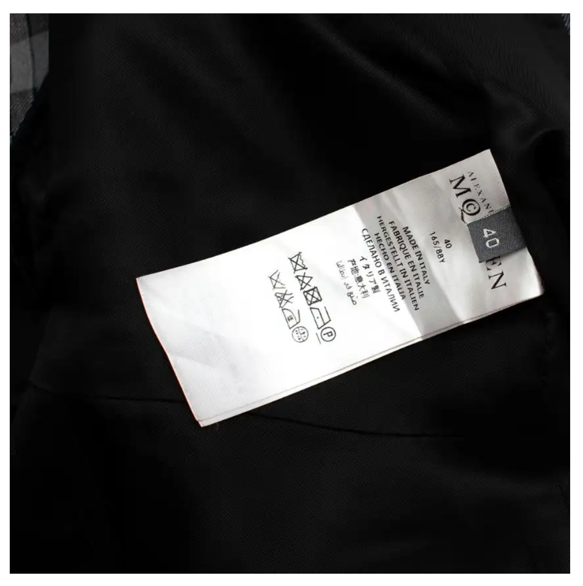 Tag of the Blazer Grey with Black from Alexander McQueen, size 4, made in Italy.